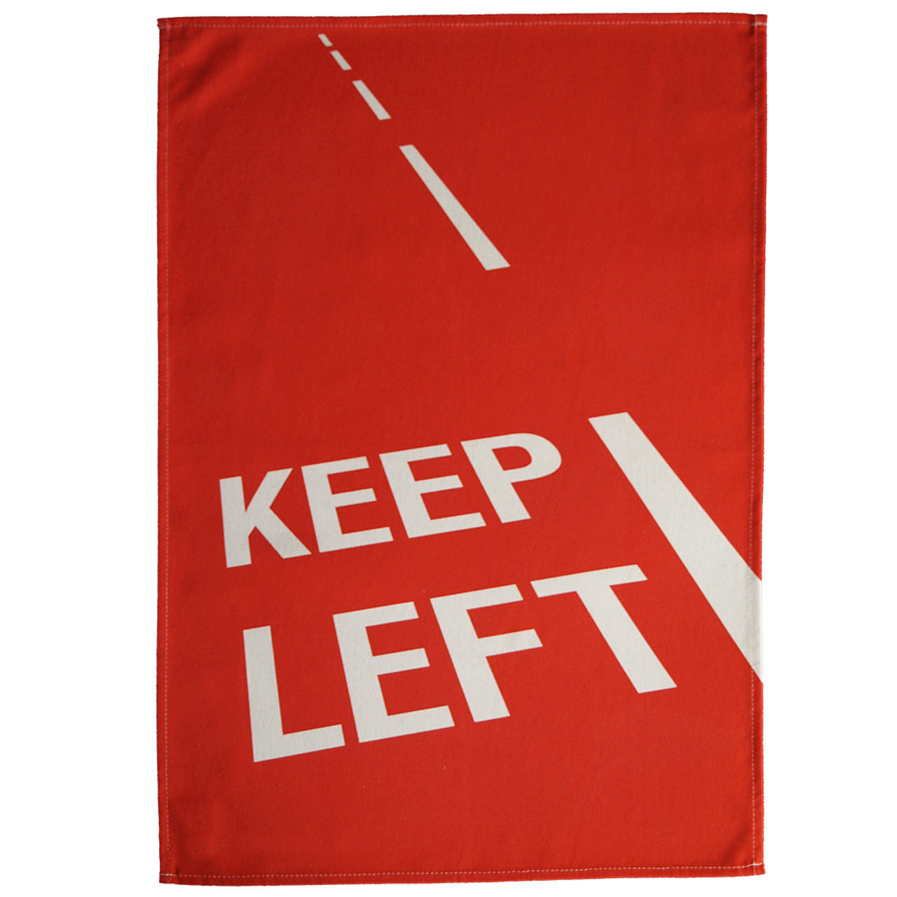 Red tea towel with the words Keep Left on a road
