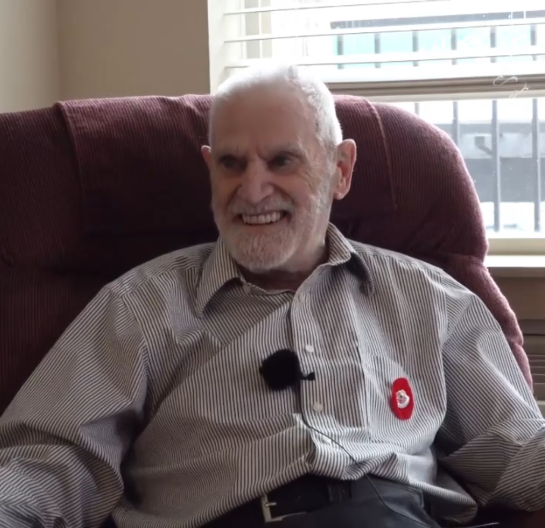 Lucien Lessard headshot Photo of Lucien Lessard, Ironworker % Second Narrows survivor, sitting for an interview.